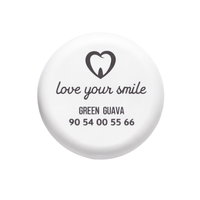 White magnetic aligner box engraved with clinic name, logo and contact number