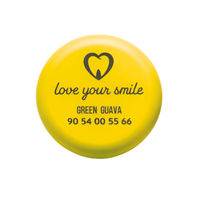 Yellow magnetic aligner box engraved with clinic name, logo and contact number