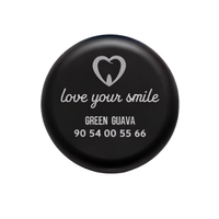 Black magnetic aligner box with silver engraved clinic name, logo and contact number