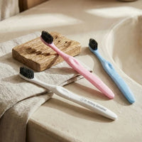 Green Guava soft-bristle dental toothbrush