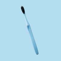 Green Guava soft-bristle dental toothbrush